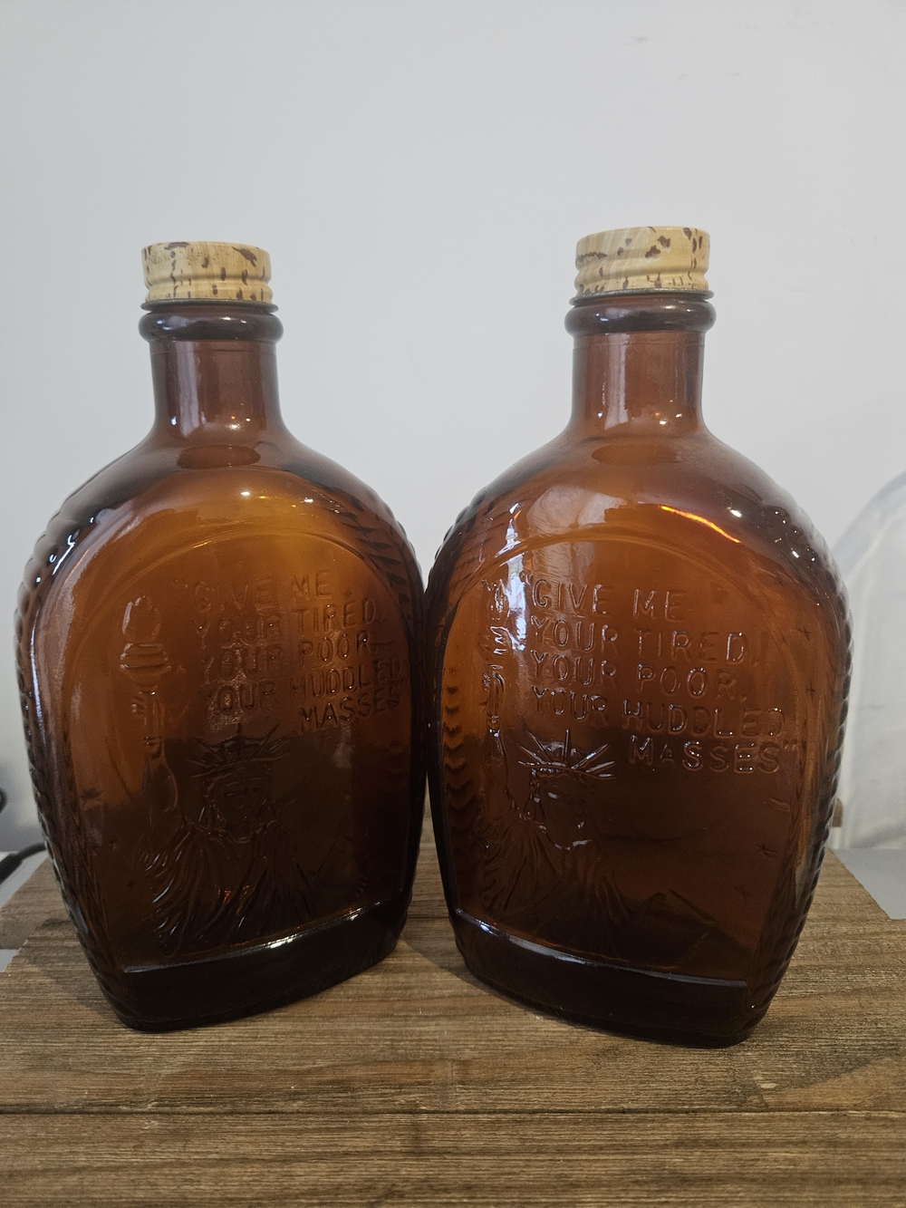 Vintage Log Cabin amber glass commemorative bottles FEATURING STATUE OF LIBERTY